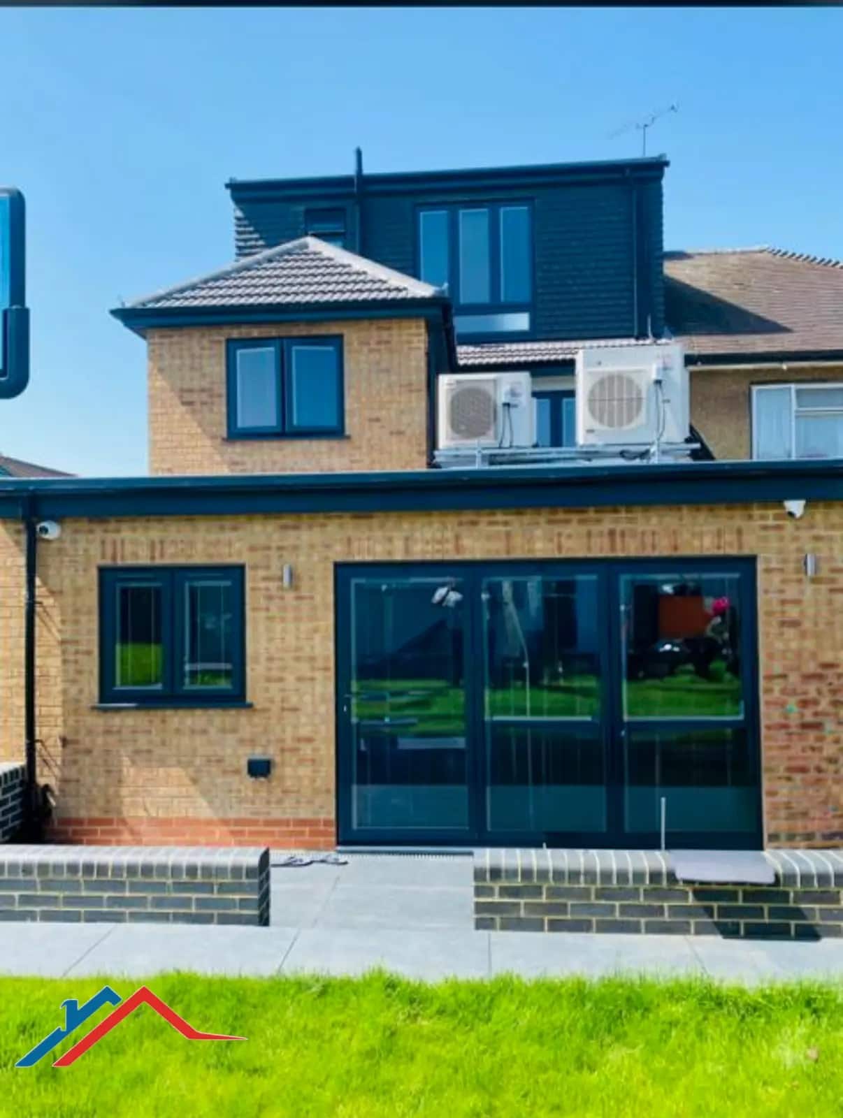 Rear extension with bi-fold doors and a dormer above, Gants Hill